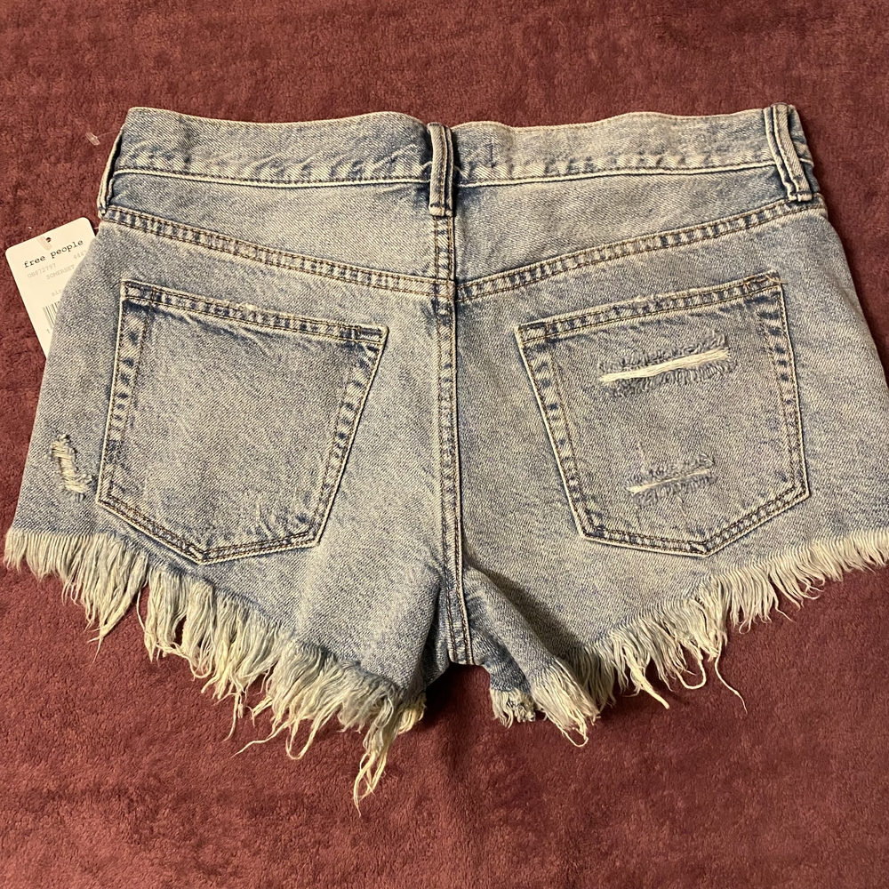Free People Button Fly Light Blue Distressed Jean Shorts - Picture 3 of 7
